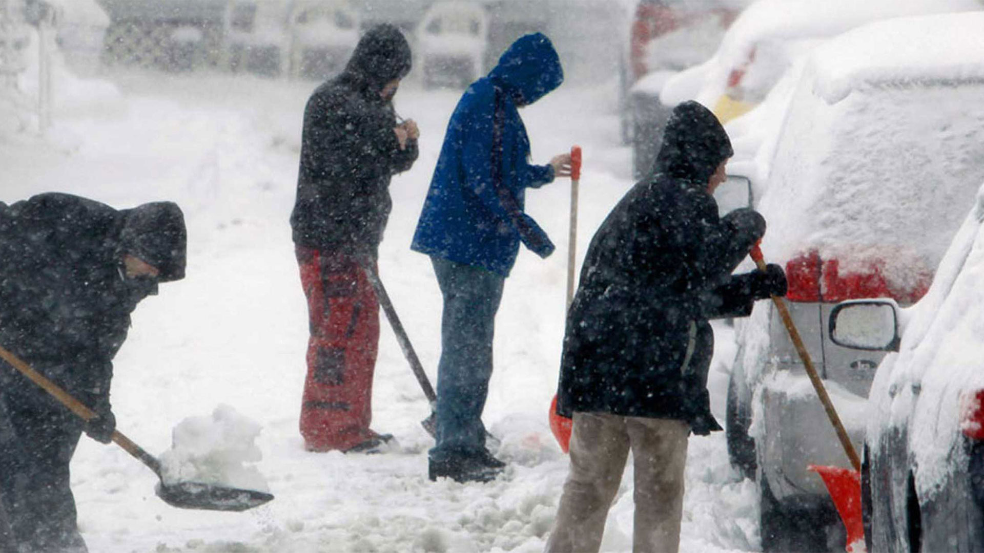 People in heavy snow